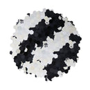 Black and white hexagonal tile pattern on a white , Obroi