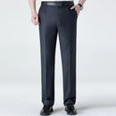 Dark gray pants worn by a person on a white background, Obroi