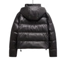 Black puffer jacket with a hood on a white  , Obroi