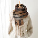 Multicolored scarf with fringe on a mannequin against a white background, Obroi