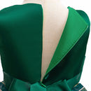 Close-up back view of a green satin garment displayed on a beige dress form, showing a large open back, satin trim, and a bow at the waist, Obroi