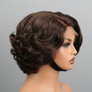 A dark brown wavy wig displayed on a mannequin head, shown from the side against a plain gray background. The brand name 'Obroi' is written in black script in the top left corner.
