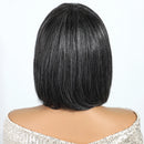 Back view of a person with straight black hair on a white background, Obroi