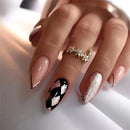 Close-up of a hand with decorative nails and a ring on a light background, Obroi