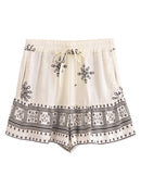 White shorts with black embroidery on a white background, Obroi