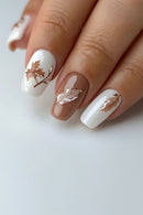 Nails with white and brown design on a white background, Obroi