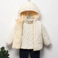 White puffer jacket with fur lining on a hanger against a white background, Obroi