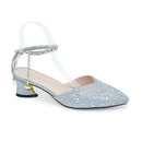 Silver studded high heel shoe on a white background, Obroi