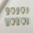 Set of decorative nail art designs on a light background, Obroi