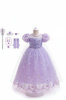 A children's purple princess dress costume displayed on a mannequin, with matching accessories shown to the left and the text '8PCS' on the right. The set includes a sparkly lavender gown with puffed sleeves, a sheer veil, tiara, gloves, and a wand on a white background, Obroi