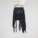 Black layered skirt with embellishments on a hanger against a white background, Obroi