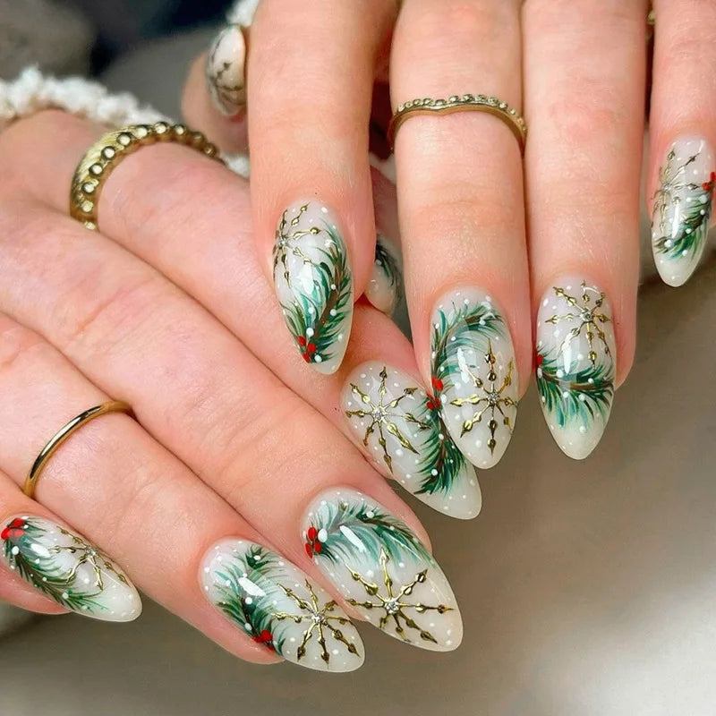 Nails with festive design featuring green leaves and red berries on a neutral background, Obroi