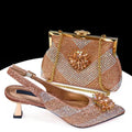 Rose gold studded clutch and shoes on a white background, Obroi