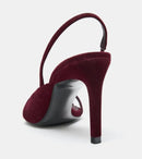 Maroon high-heeled shoe with a slingback design on a light gray background, Obroi