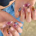Close-up of hands with colorful nail art on a blurred background, Obroi