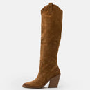 Brown knee-high boot on a white , Obroi