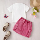 White t-shirt, pink skirt, sandals, hat, and butterfly on a light gray background, Obroi