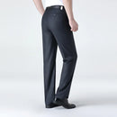 Dark gray pants worn by a person on a white background, Obroi