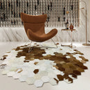 Hexagonal patterned rug with a brown chair in a stylish room, Obroi