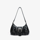 Black handbag with a silver buckle on a white background, Obroi