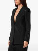 Black blazer with subtle pattern on a white background, Obroi