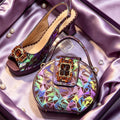A matching women's slingback shoe and handbag set in iridescent purple geometric print with jeweled square embellishments, displayed on purple satin fabric, Obroi