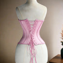 Pink corset on a mannequin against a neutral background, Obroi