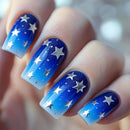 Nails with blue gradient and silver star designs, Obroi