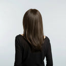 Woman with long brown hair styled in a straight manner on a plain background, Obroi