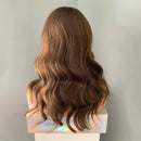 Mannequin head with long, wavy brown hair on a neutral background, Obroi