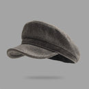 Gray flat cap on a gray background, Obroi
