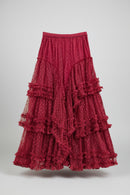 Red tiered skirt with ruffles on a white background, Obroi