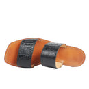 Brown sandal with black crocodile-patterned straps on a white background, Obroi