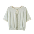 Light green cardigan with lace trim on a white background, Obroi