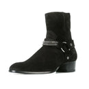 Black suede boot with silver chain and buckle detail on a white background, Obroi