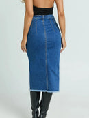 Blue denim skirt worn by a person on a white background, Obroi
