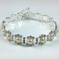Pearl bracelet with silver accents on a white background, Obroi