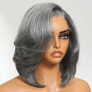 Gray wig on a mannequin head with 'Obroi' branding.