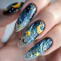 Nails with starry night design featuring blue, yellow, and gold colors, Obroi