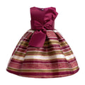 Children's dress with a large bow and striped skirt on a white background, Obroi
