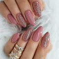 Nails with pink and glittery design on a white background, Obroi