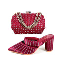 Red shoe and handbag set with rhinestone details on a white background, Obroi