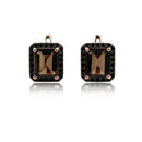 Pair of earrings with smoky brown gemstones on a white background, branded 'Obroi'.