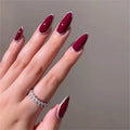 Hand with burgundy nail polish on a neutral background, Obroi