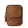 Brown leather pouch with a zipper on a white background, Obroi