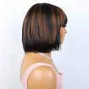 Woman with a styled bob haircut on a plain background, Obroi