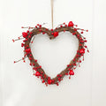 Heart-shaped wreath with red berries on a white background, Obroi