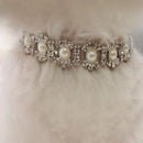 Pearl and crystal choker necklace on a fur background, Obroi