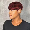 Woman with burgundy hair styled in a bob against a neutral background, Obroi