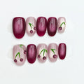 Handmade nails with cherry design on a white background, Obroi